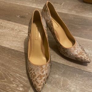 Very classy shoes! Leopard pattern in silver and rose gold sparkles! Like new!